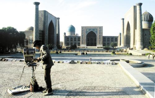 An artist paints at Registan Square in Samarkand.