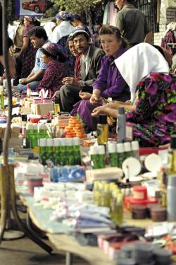 Sidewalk bazaars can be found in almost all of the countries of the Silk Road today. Here people sell toiletries and other goods on a street in Osh, Kyrgyzstan.