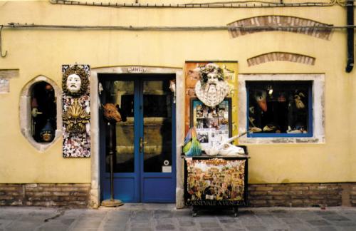 Small shops dot the lanes in Venice and represent the long-standing commercial activity of the city. This shop sells the famous masks worn during the annual Venice Carnival.
