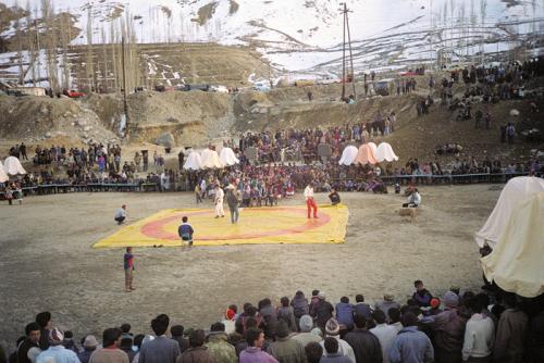 Paintings and literature depict sports competitions at oases along the Silk Road. Here contemporary wrestlers in Khorog, Tajikistan, compete on a large mat in the center of the town.