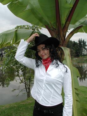 Ana Veydó Ordóñez, the only woman in Grupo Cimarrón, prefers singing the hard-edged golpe recio, claiming her place in this male-driven, robust, coarse style of singing.
