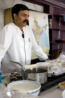 Chef and co-owner of Indique and Bombay Bistro restaurants in the Washington, D.C., area, K.N. Vinod takes part in a cooking demonstration with the Asian Pacific Americans program, 2010 Smithsonian Folklife Festival.