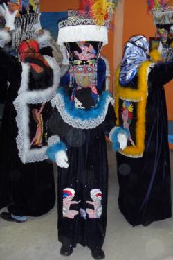 A costumed Chinelo dancer.