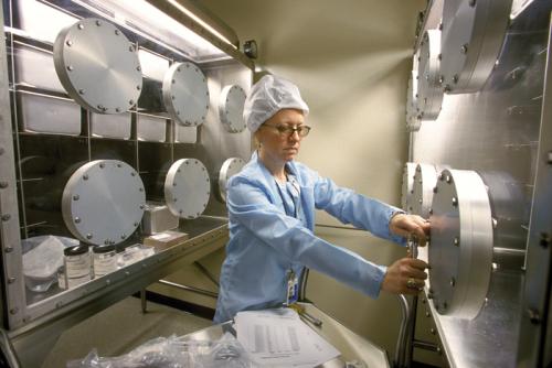 Linda Welzenbach, a geologist with the National Museum of Natural History's Department of Mineral Sciences, works in the Antarctic meteorite storage facility at the Smithsonian's Museum Support Center in Silver Hill, Maryland.