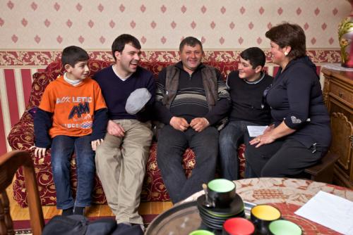In Azerbaijan, Peace Corps volunteer Tim McNaught spends time with his host family-eating, cooking, and playing the saz.