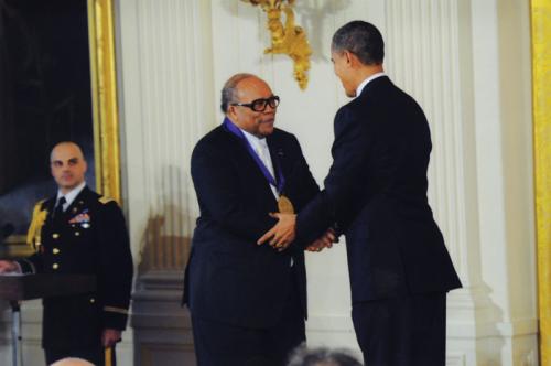 At a 2010 White House ceremony, President Obama presents renowned composer and musician Quincy Jones with a National Medal of Arts in recognition of his outstanding achievement and support of the arts.