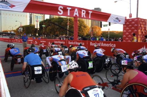 Members of the University of Illinois Wheelchair Track Team prepare for the start of the 2011 Chicago Marathon.