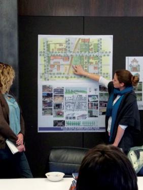 Iowa State University College of Design students use maps to discuss design problems with community members; in this case, the issue was to rebuild sustainably the neighborhoods in Cedar Rapids damaged by flooding.