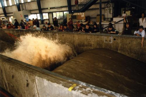 A group of schoolchildren visit Oregon State University to learn about the power of waves.