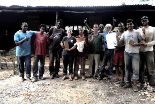 A team led by researchers from Texas A&amp;M University poses in front of the facility in the Dominican Republic where they worked to bring safe drinking water to victims of the Haiti earthquake in 2012.