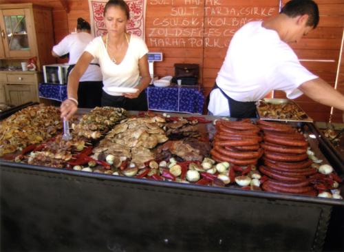 Traditional Hungarian sausages, fish, and ham hocks are sold at the 2012 Festival of Folk Arts in Budapest.