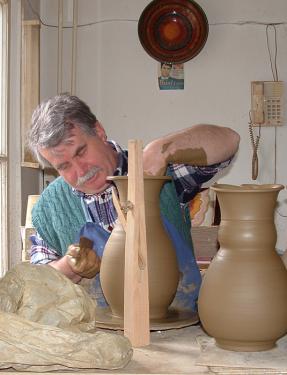 Lajos Busi is a master potter in the town of Mez&otilde;t&uacute;r, where the tradition of pottery-making is still carefully maintained in the community.