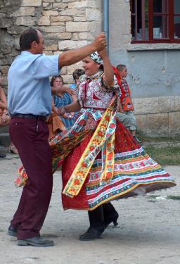 A father and his daughter dance at a wine harvest festival in the Kalotaszeg region of Transylvania (Romania), 2010.