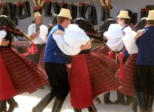Young couples dance at a 2009 festival in Sz&eacute;k, Transylvania (Romania). While younger generations wear traditional folk costumes only for special occasions, the older generations still prefer them for weekdays and holidays alike.