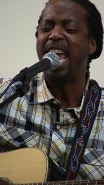Garifuna artist James Lovell from Brooklyn, New York, uses music, songs, storytelling, and poetry to inspire young people to learn the Garifuna language and take pride in their cultural heritage.