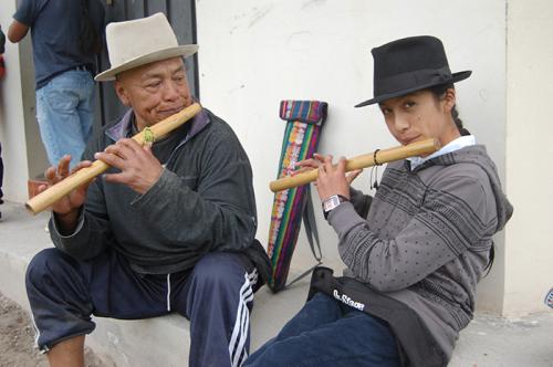 Flute master Mariano Maldonado (left) practices a song with one of his students, Michael Chiza, after a Sunday class at the Hatun Kotama Flute School in Kotama, Ecuador.