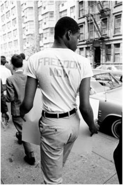 T-shirts emblazoned with slogans expressed the aspirations of 1960s civil rights activists.
