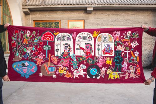 Embroidered patchwork picture by Gao Fenglian.