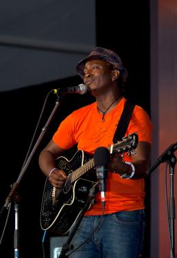 Eric Wainaina, a singer-songwriter known for his blend of benga rhythm and modern harmonies, performs.
