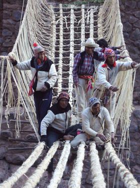 Craftsmen from the Huichire community work together to build the rope bridge, an ancient tradition passed down through generations and involving the entire community.