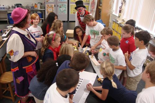 Fifth graders investigate force and motion through the teeterboard circus act.