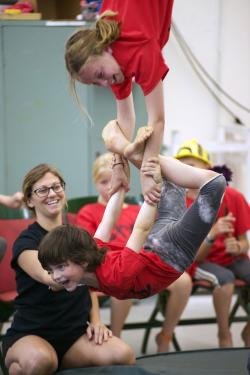 Young campers learn a duo trapeze act.