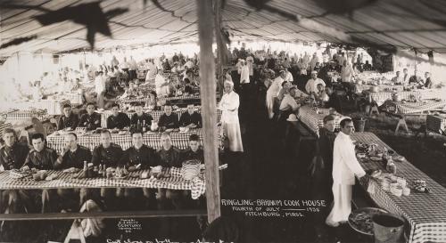 On July 4, 1935, circus staff gather at the Ringling Bros. cookhouse to eat and celebrate.