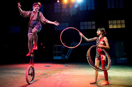 Balancing on a unicycle is trickier while also hula-hopping.