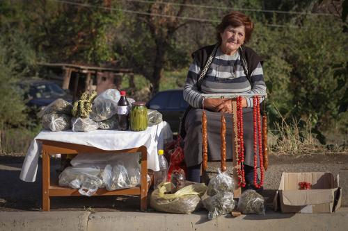 Farmers and villagers alike set up stalls along the road to sell their wares. This woman is selling bags of dried aveluk (wild sorrel) and sujukh, a sweet made from walnuts dipped into grape or mulberry syrup.