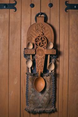 Elaborately adorned spoon containers were also popular, with a space for each family member’s spoon.