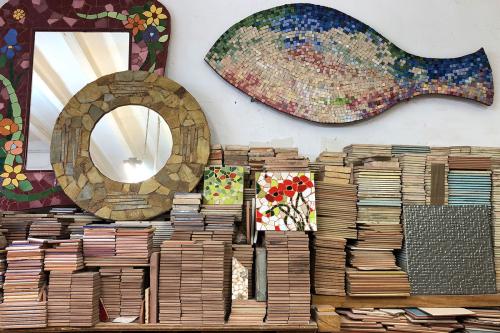 Livia Garreta&rsquo;s studio in Barcelona is stacked with colorful tiles that will be shattered and arranged into beautiful mosaics.