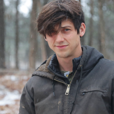 A headshot in the woods.