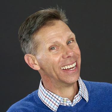 Terry Sanders headshot, smiling.