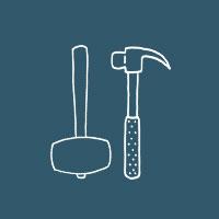 Illustrated mallet and hammer in a dark turquoise circle.