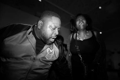A man and woman dance.