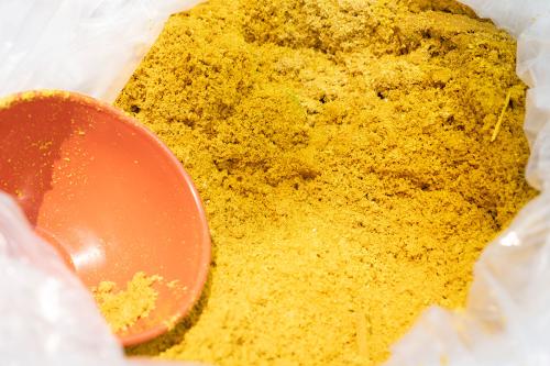 Yellow dyed sawdust