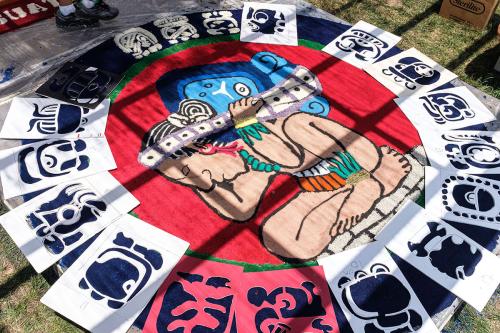 Detail of El Cargador del Tiempo (The Carrier of Time), a Maya deity that carries the weight of the whole year on his back, featured at the bottom of the second alfombra.