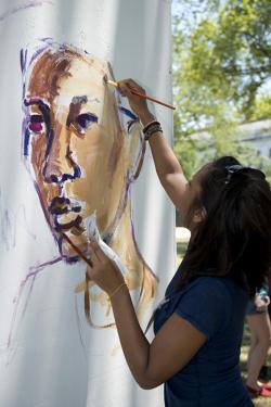 An artist works on a mural installation in the &ldquo;Citified&rdquo; program. Photo by Walter Larrimore, Smithsonian Institution