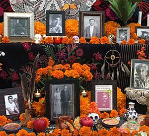 Altar with flowers and photos.