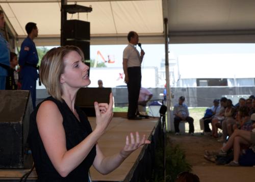 American Sign Language interpreters work at stages throughout each Festival program to make the cultural performances and presentations accessible to all visitors