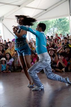 Edinson Dario Vanegas Amaya demonstrates tango moves with an audience member