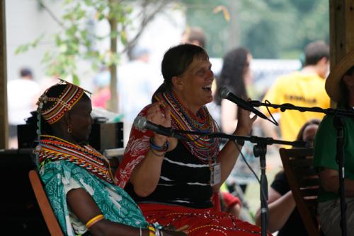 Laura Lemunyete (right), a returned Peace Corps volunteer, and Ngaharin Lebitileg, a weaver from the Ngurunit Basket Weavers Group, participate in a discussion session