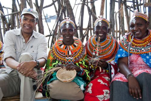 Peace Corps director Aaron Williams with Ngurunit Basket Weavers Group members (from left to right) Nkerisapo Lewano, Nankaya Lebitilig, and Lilian Lekadaa