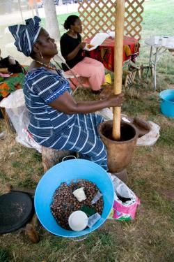 Shietu Braimah of Damongo, Ghana, demonstrates the process of making shea butter.