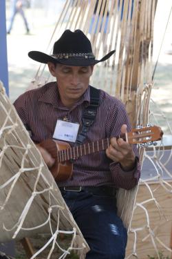 Félix Chaparro Rivas of Grupo Cabrestero relaxes between performances and demonstrations in the Southeastern Plains section of the Colombia program.