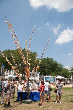 The Wish Tree, an installation in the Peace Corps program, is covered with messages honoring the memory of lost Peace Corps friends and offering good will to Peace Corps volunteers and partners around the world.