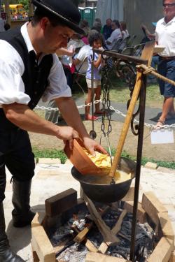 Preparing the slambuc in the cauldron.
