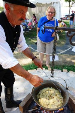 Cooking slambuc outdoors.