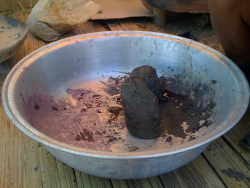  In the process of molding the clay.