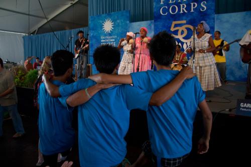 Audience members dance to the Garifuna Collective and Umalali.